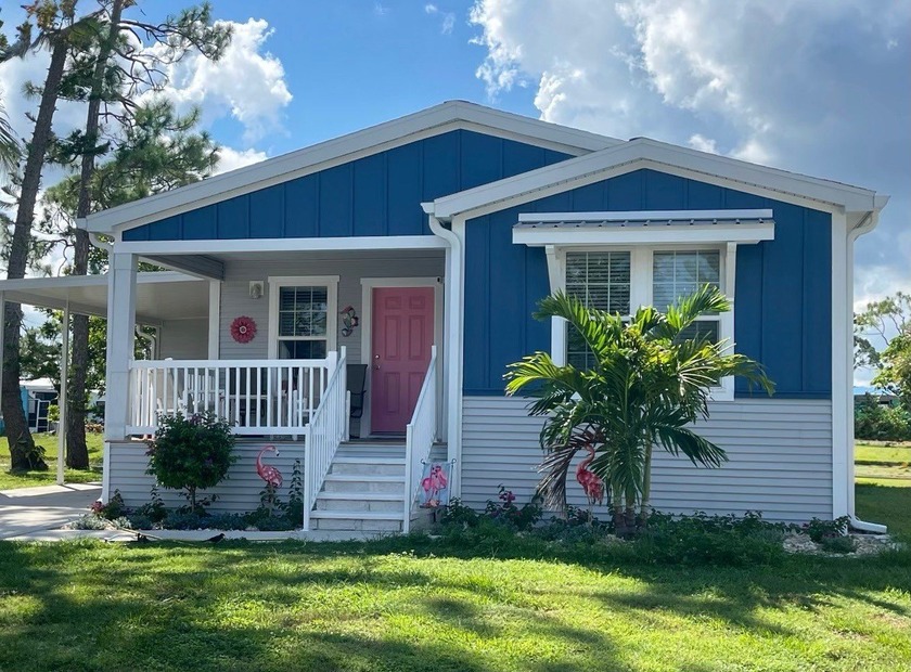 Welcome to this stunning 3-bedroom, 2-bath home in the Lake - Beach Home for sale in North Fort Myers, Florida on Beachhouse.com
