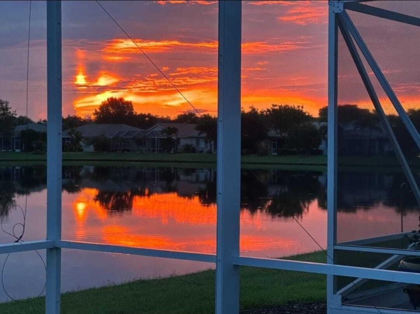 Best Sunrises in Baywinds!The home showcases serene lakefront - Beach Home for sale in West Palm Beach, Florida on Beachhouse.com