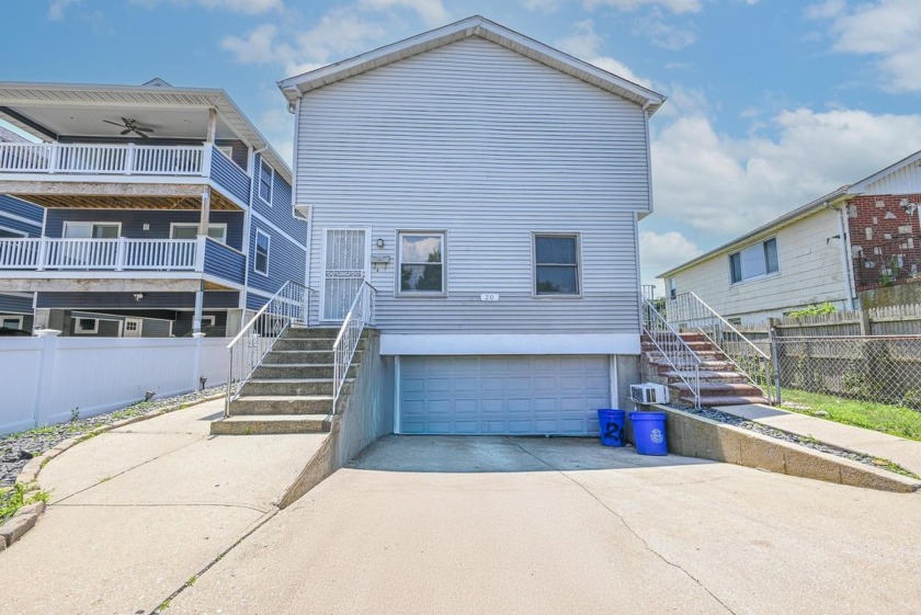 Welcome to this incredible two-family duplex in the heart of - Beach Townhome/Townhouse for sale in Long Beach, New York on Beachhouse.com