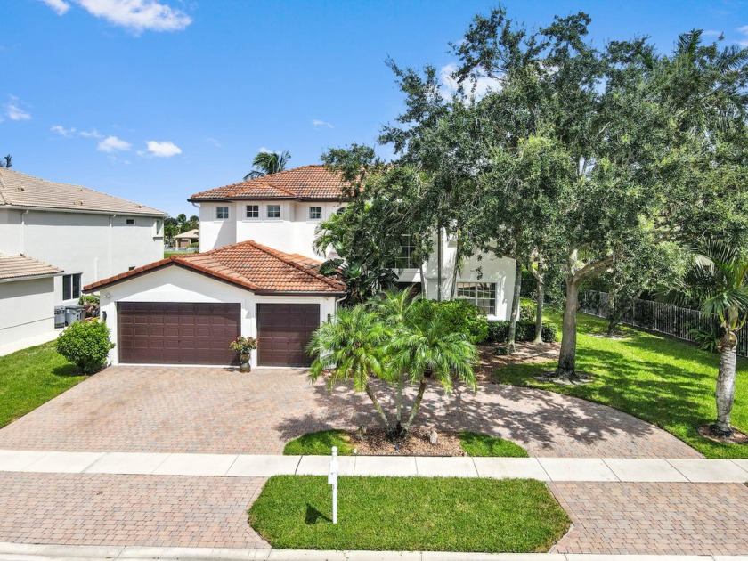 Welcome to Isola Bella Estates, a prestigious gated community - Beach Home for sale in Lake Worth, Florida on Beachhouse.com