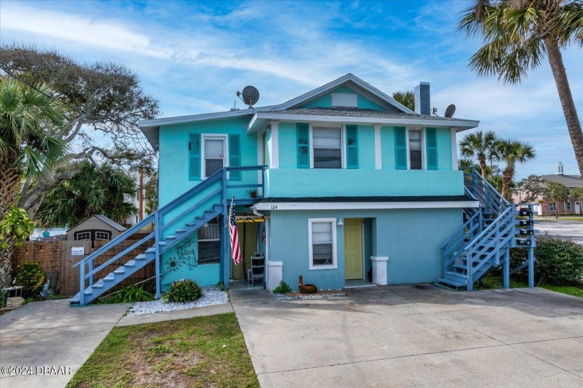 This Key West style quadruplex in the Surfside Historic District - Beach Home for sale in Daytona Beach, Florida on Beachhouse.com