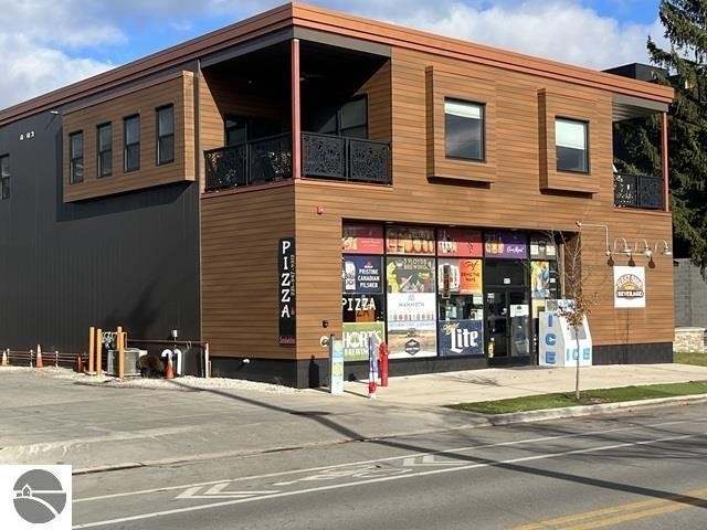 Built in 2020, is a remarkable 6,969 SF mixed use building - Beach Commercial for sale in Traverse City, Michigan on Beachhouse.com