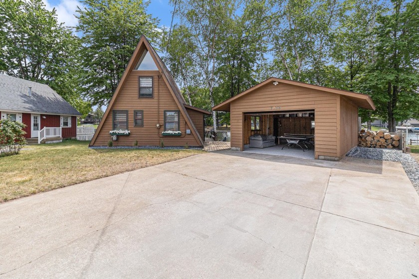 Rare Investment Opportunity on Pristine Upper Silver Lake!
 - Beach Home for sale in Mears, Michigan on Beachhouse.com