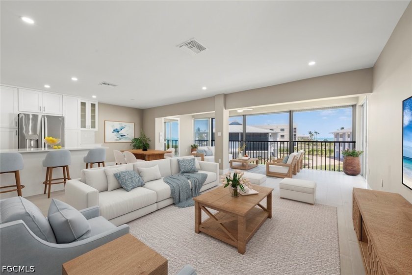 Perched on the top floor in a desirable corner location, this - Beach Condo for sale in Sanibel, Florida on Beachhouse.com