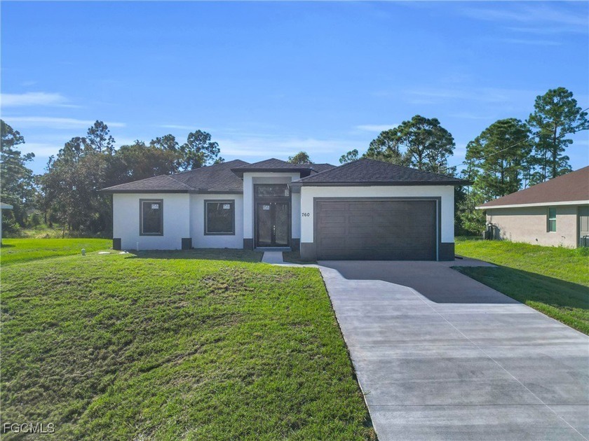 NEW CONSTRUCTION | MODERN DESIGN | IMPACT WINDOWS. Experience - Beach Home for sale in Lehigh Acres, Florida on Beachhouse.com
