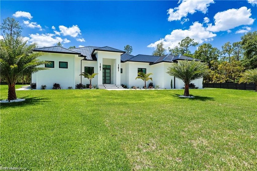 100% uplands. This exquisite new-construction residence offers - Beach Home for sale in Naples, Florida on Beachhouse.com