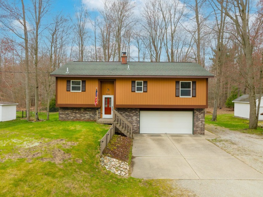 Well cared for, single-owner home, with peaceful views of over 3 - Beach Home for sale in Norton Shores, Michigan on Beachhouse.com