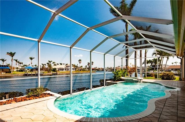 GULF ACCESS EXTRA WIDE/INTERSECTING  CANAL VIEWS....NO WATER - Beach Condo for sale in Cape Coral, Florida on Beachhouse.com