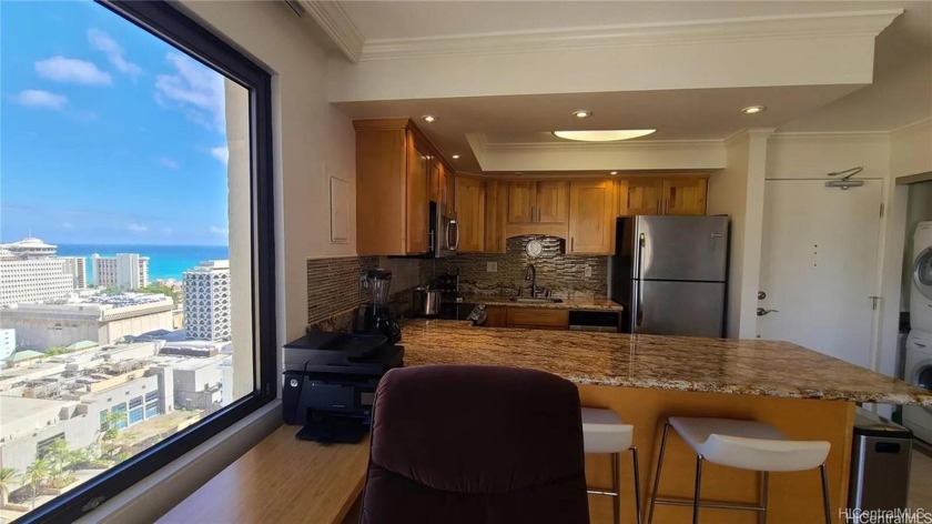 Rarely available Penthouse unit with instant rental income at - Beach Condo for sale in Honolulu, Hawaii on Beachhouse.com