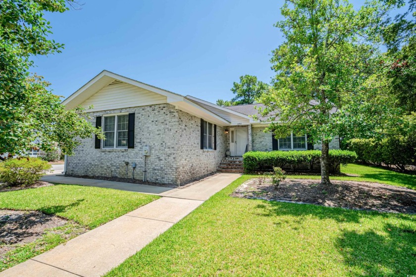 Brick 3 bedroom, 2 bath home in the highly desired Fox Hollow - Beach Home for sale in North Myrtle Beach, South Carolina on Beachhouse.com