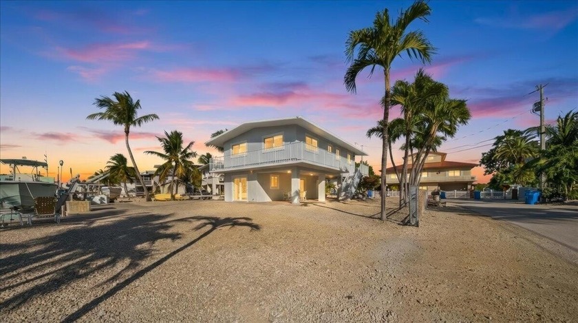 Solid concrete ocean-side waterfront home offering 79 feet of - Beach Home for sale in Plantation Key, Florida on Beachhouse.com