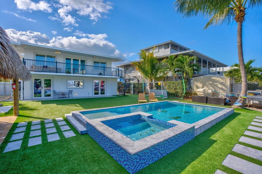 Offered at a compelling market price this canal front home - Beach Home for sale in Plantation Key, Florida on Beachhouse.com