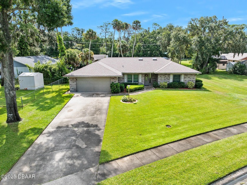 Florida Gem! Discover this stunning 3BR/2BA pool home in the - Beach Home for sale in Port Orange, Florida on Beachhouse.com