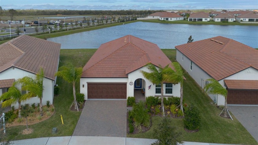 Beautiful home with POND frontage in the Medley at Southshore - Beach Home for sale in Wimauma, Florida on Beachhouse.com