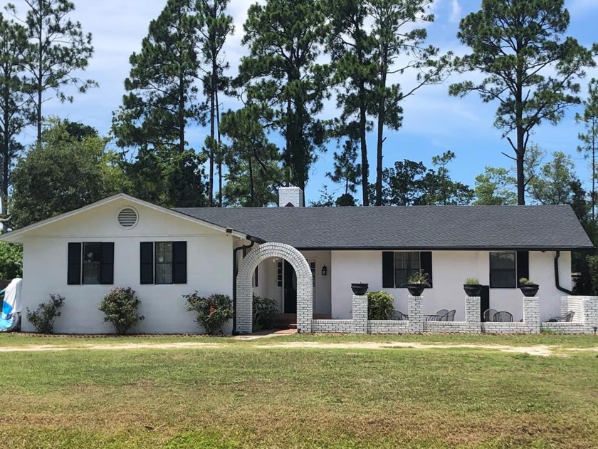 Enjoy gorgeous water views from the private front courtyard of - Beach Home for sale in Carabelle, Florida on Beachhouse.com