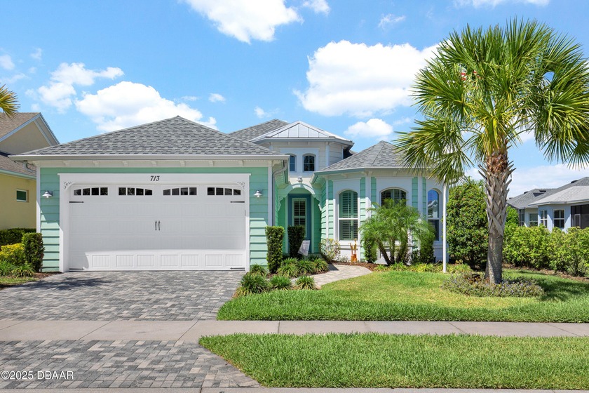 This Perfect Parrot model sits on a corner lot with extra green - Beach Home for sale in Daytona Beach, Florida on Beachhouse.com