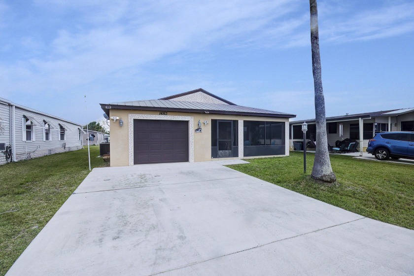 Experience the elegance of this beautifully upgraded 2/2/1 CBS - Beach Home for sale in Fort Pierce, Florida on Beachhouse.com