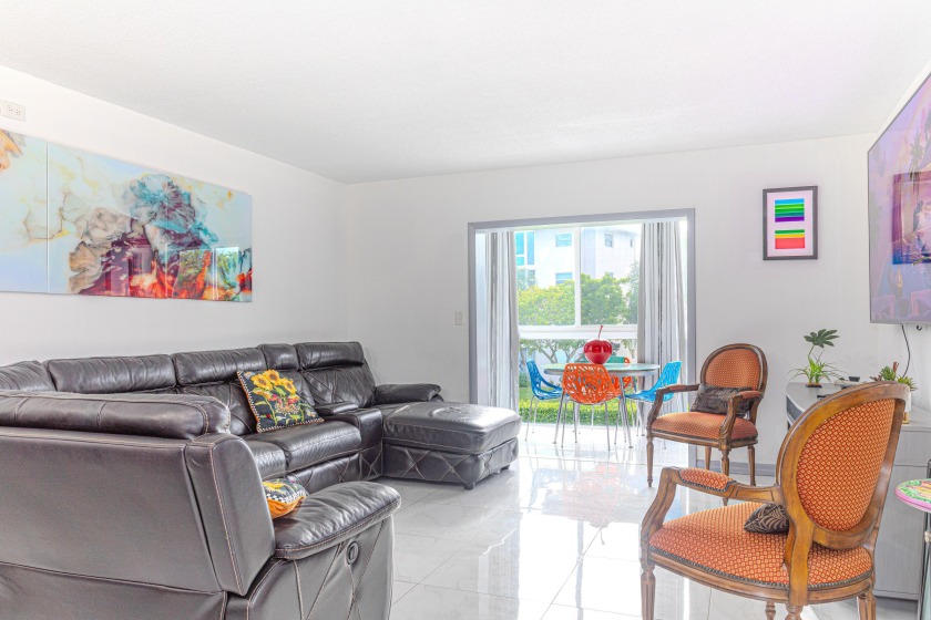 Ready to retire in style? This fabulous corner unit in a lively - Beach Condo for sale in Lake Worth, Florida on Beachhouse.com