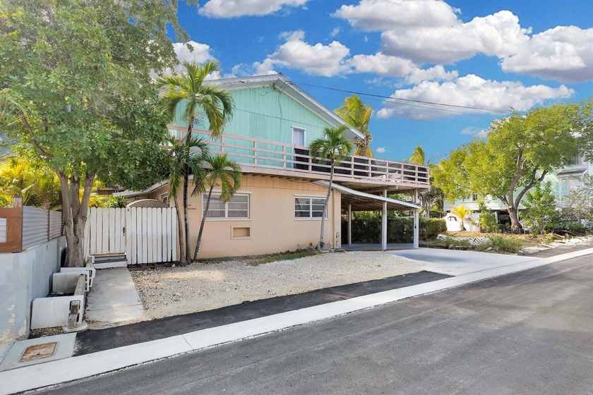 1614 Dennis St is a rare income-producing triplex offering - Beach Home for sale in Key West, Florida on Beachhouse.com