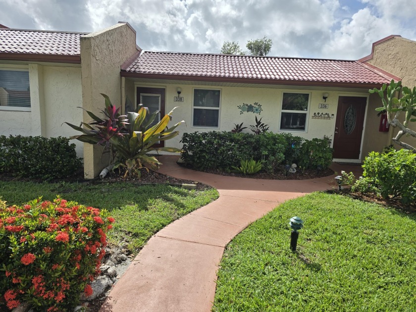 SPACIOUS 2 BDRM VILLA, NICELY RENOVATED, IMPACT WINDOWS & DOORS - Beach Home for sale in West Palm Beach, Florida on Beachhouse.com