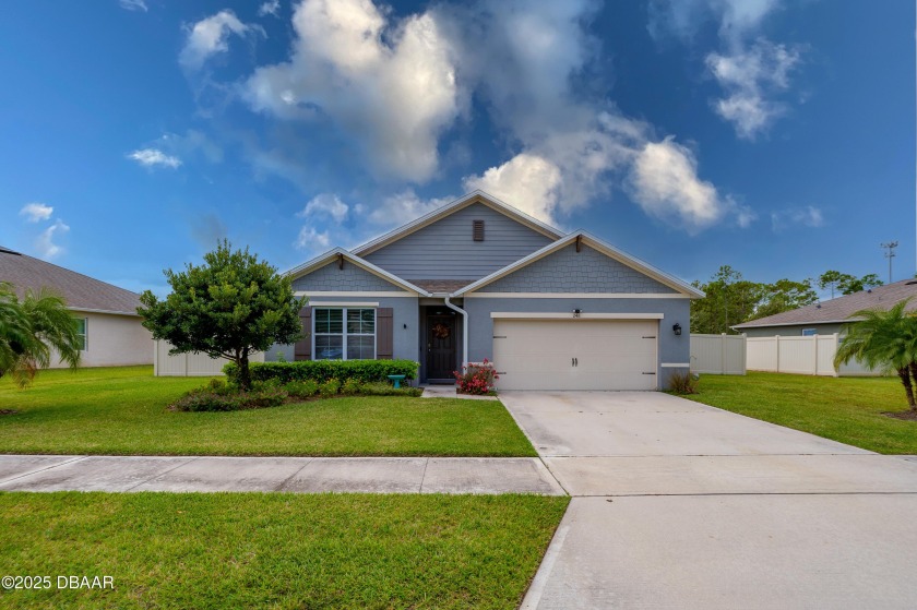Move-In Ready 4-Bedroom Ranch with Lake View and Community Pool - Beach Home for sale in Ormond Beach, Florida on Beachhouse.com