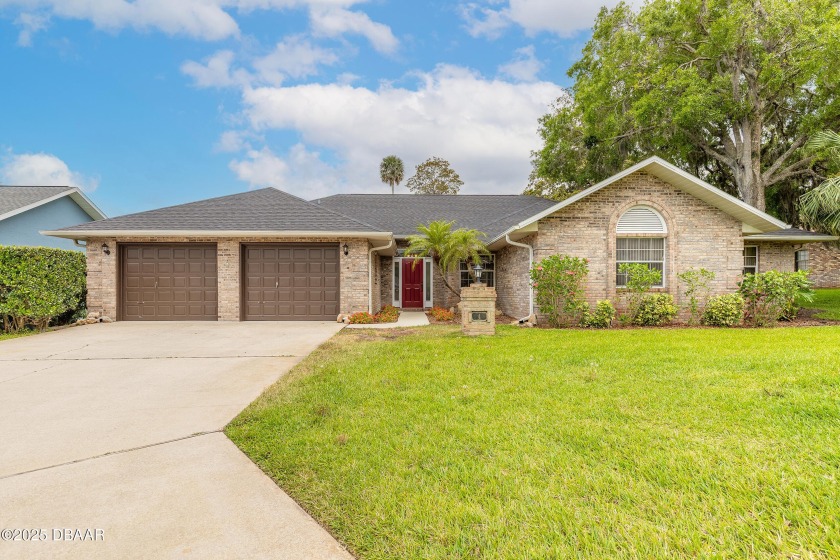 Tucked away in the highly sought-after Whispering Oaks community - Beach Home for sale in Ormond Beach, Florida on Beachhouse.com