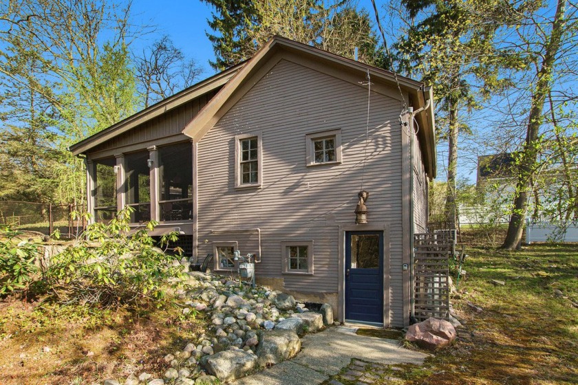 Investment opportunity. STR is permitted. This charming cabin - Beach Home for sale in Douglas, Michigan on Beachhouse.com