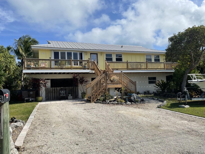 This 2 bedroom 2 bath home with bonus room is located just - Beach Home for sale in Big Coppitt, Florida on Beachhouse.com