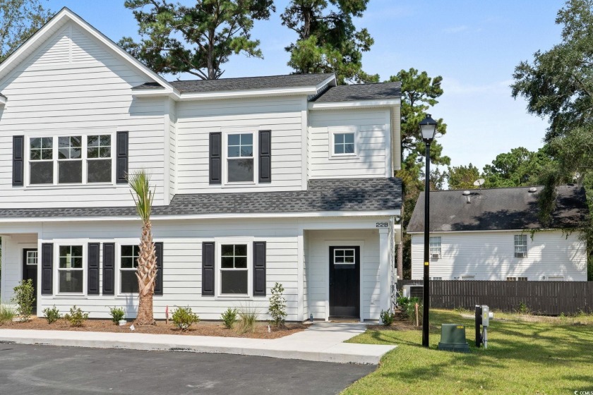 Introducing 22B Bobo Lane, a beautifully crafted new - Beach Townhome/Townhouse for sale in Pawleys Island, South Carolina on Beachhouse.com