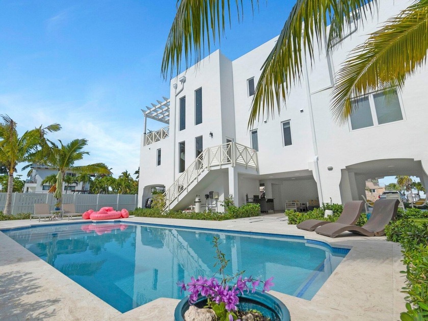 ACROSS THE STREET FROM THE ATLANTIC OCEAN! Rare opportunity to - Beach Home for sale in Duck Key, Florida on Beachhouse.com