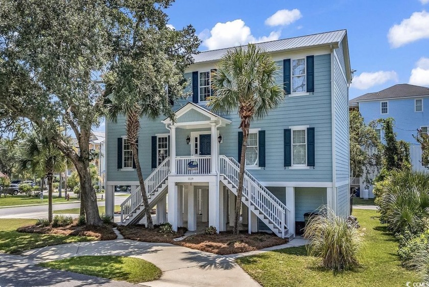 Discover coastal living at its finest with this stunning 6 - Beach Home for sale in Surfside Beach, South Carolina on Beachhouse.com