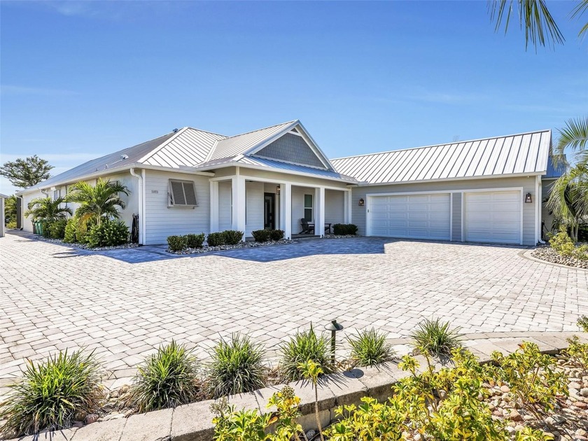Welcome to 28976 Smugglers Lane, a residence that embodies - Beach Home for sale in Punta Gorda, Florida on Beachhouse.com