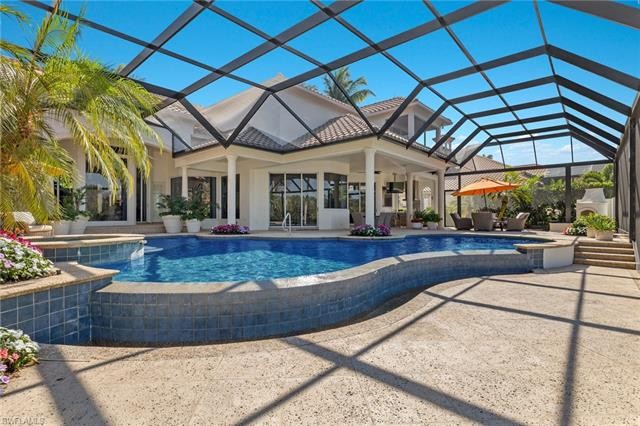 Experience luxury living at its finest in this Clive Daniel - Beach Home for sale in Bonita Springs, Florida on Beachhouse.com