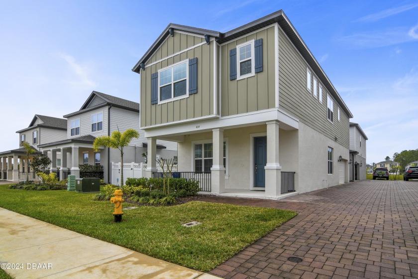 Welcome to this charming 4-bedroom, 2.5-bath Meritage Homes - Beach Home for sale in New Smyrna Beach, Florida on Beachhouse.com