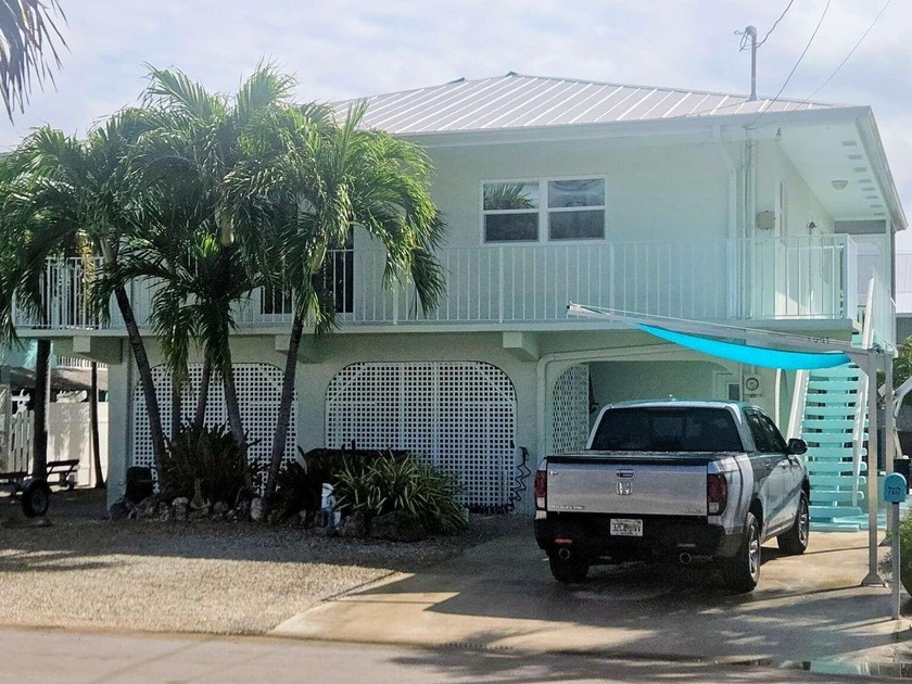 Location, Location and Location Enter the Palm Tree - Beach Home for sale in Summerland Key, Florida on Beachhouse.com