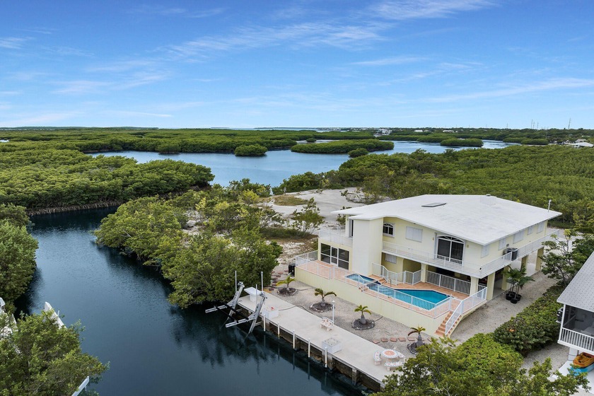 Paradise found. This exceptional 4-bedroom, 3-bath concrete pool - Beach Home for sale in Key Largo, Florida on Beachhouse.com