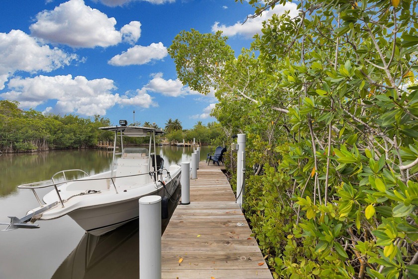 Tucked along the water in a nature lover's paradise, and - Beach Home for sale in Key Largo, Florida on Beachhouse.com
