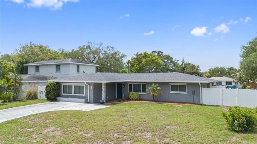 Come see this move-in ready 3-bedroom, 2-bath, 2-car garage home - Beach Home for sale in Largo, Florida on Beachhouse.com
