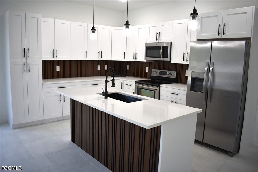 Welcome home! This beautifully designed new construction home in - Beach Home for sale in Lehigh Acres, Florida on Beachhouse.com