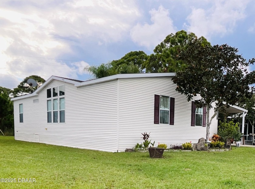 Welcome Home! Discover this beautiful 2005 Palm Harbor 2 bedroom - Beach Home for sale in Edgewater, Florida on Beachhouse.com