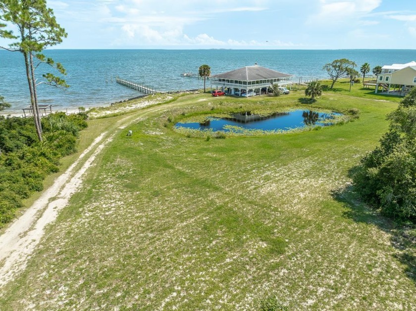 MUST SELL - Relocating!!!!   BAY FRONT - 2.2 acre property with - Beach Home for sale in Carabelle, Florida on Beachhouse.com