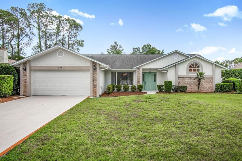 Beautifully maintained custom home located in the desirable Pine - Beach Home for sale in Palm Coast, Florida on Beachhouse.com