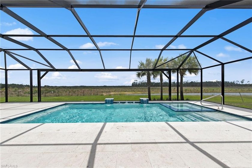 Tucked inside the gates of Verdana Village, this stunning Sunset - Beach Home for sale in Estero, Florida on Beachhouse.com