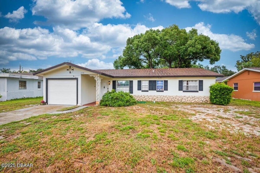Welcome to this delightful 3-bedroom, 2-bath concrete block home - Beach Home for sale in Ormond Beach, Florida on Beachhouse.com