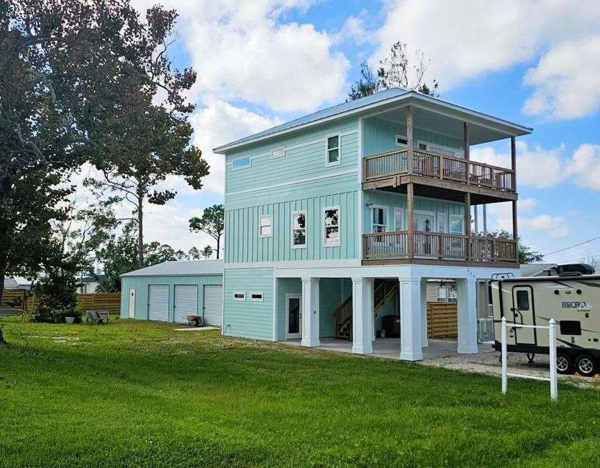 WE HEARD YOU! THE EXTERIOR COLOR WAS TOO MUCH!  LOOK AT THIS - Beach Home for sale in Port St Joe, Florida on Beachhouse.com