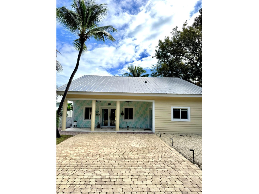 Discover your slice of paradise in the heart of Key Largo. This - Beach Home for sale in Key Largo, Florida on Beachhouse.com