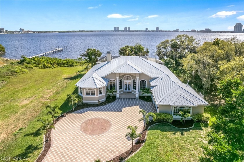 Gorgeous wide open views of the river create a magical backdrop - Beach Home for sale in North Fort Myers, Florida on Beachhouse.com
