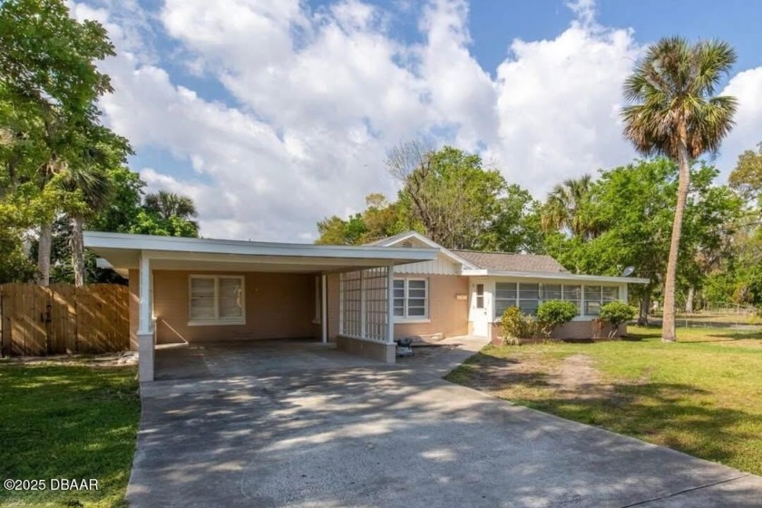 This home is located minutes from International Speedway Blvd - Beach Home for sale in Daytona Beach, Florida on Beachhouse.com