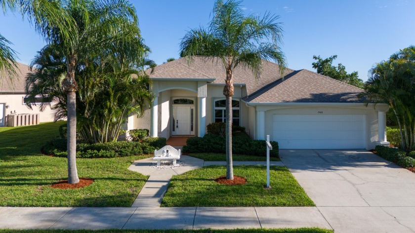 Overlooking the 10th green in the highly desired Viera East Golf - Beach Home for sale in Rockledge, Florida on Beachhouse.com