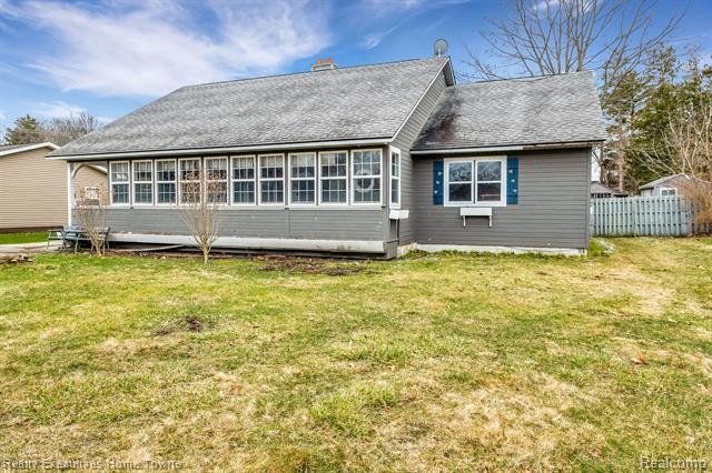This charming bungalow boasts a spacious layout of just under 3 - Beach Home for sale in Fort Gratiot, Michigan on Beachhouse.com